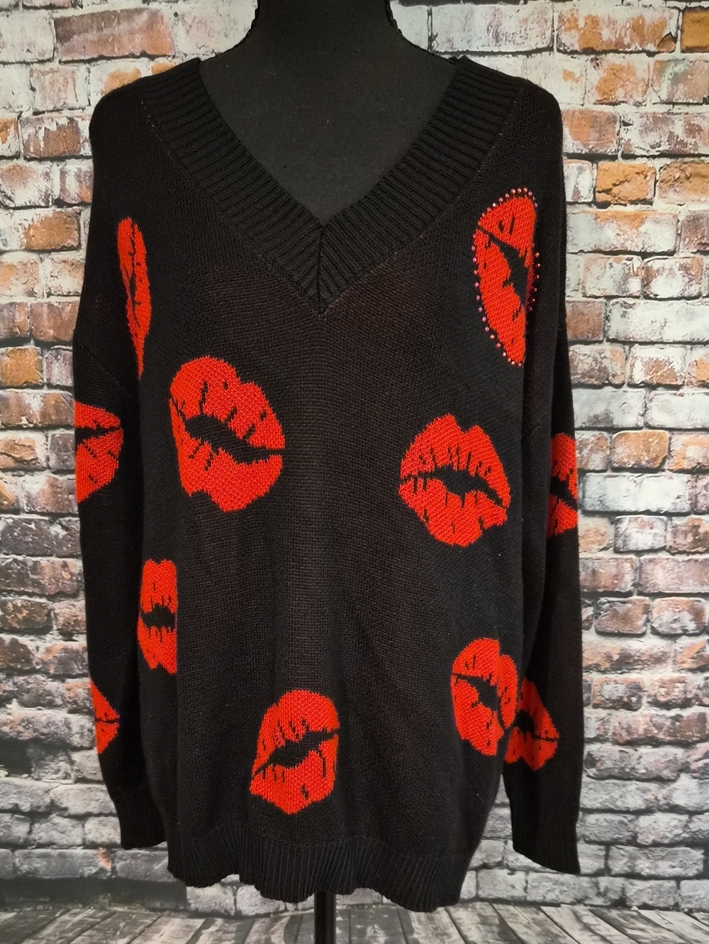 V-Neck Black Sweater with Red Lip Motif